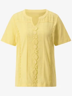 Blouse à manches courtes avec dentelle florale centrale et col rond