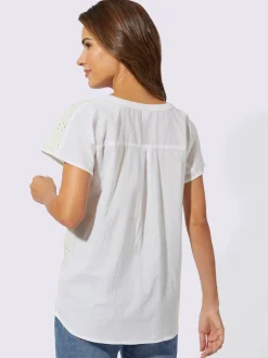 Blouse à broderie ajourée col en V et manches courtes