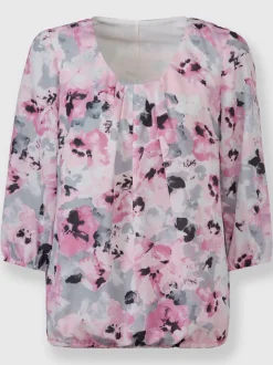 Blouse fluide à fleurs avec encolure ronde et manches trois quart