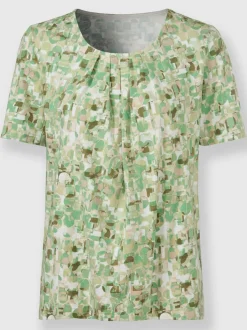Blouse fluide à manches courtes et motifs floraux