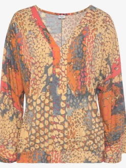 Blouse viscose douce à manches larges et col en V dégagé