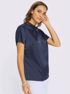 Chemisier en satin volants au col