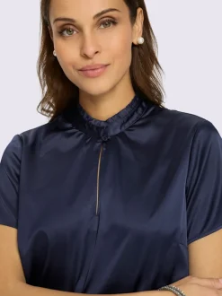 Chemisier en satin volants au col