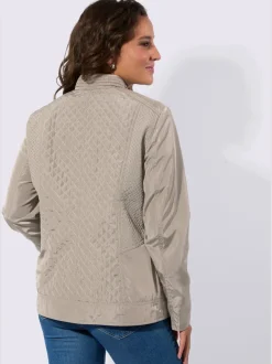 Doudoune mélange de motifs matelassés