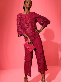 Ensemble chemisier et pantalon en dentelle florale col rond