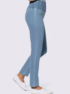 Jean stretch à ceinture smockée et poches factices