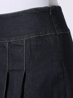 Jupe en jean petite glissière latérale avec bouton