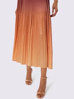Jupe plissée satin mat élégant
