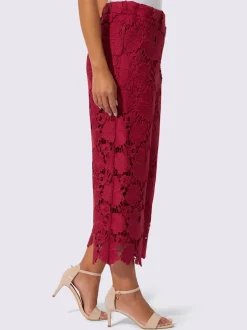 Pantalon en dentelle à motif floral et ourlet scallé
