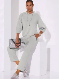 Pantalon large en mélange modal avec poche zippée devant