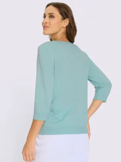 Pull encolure ronde application florale