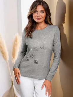 Pull encolure ronde avec manches longues motif floral et pierres