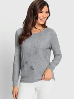Pull encolure ronde avec manches longues motif floral et pierres