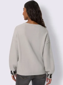 Pull en tricot inscription tendance