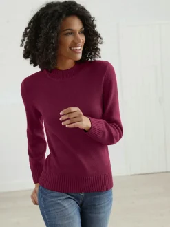 Pull en tricot uni à col montant et ourlet côtelé