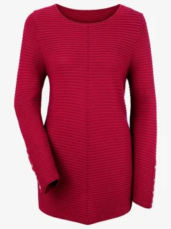 Pull long col rond avec boutons décoratifs dorés sur les manches