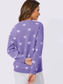 Pull à manches longues col rond en coton avec motifs cœurs