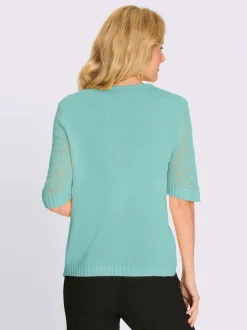 Pull motif ajouré à la manche