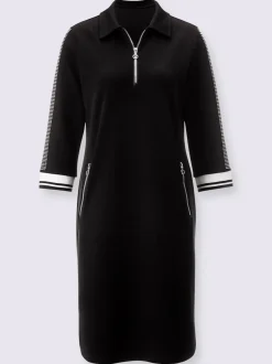 Robe polo col et manches trois quart poches zippées bords rayés