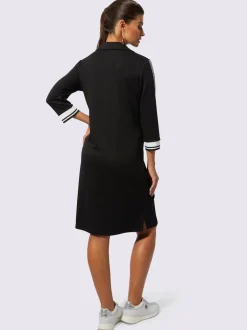 Robe polo col et manches trois quart poches zippées bords rayés