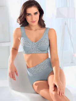 Slip gainant éléments en dentelle légèrement transparente