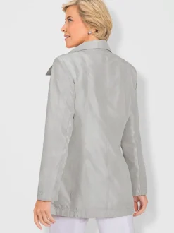 Veste de mi-saison glissière sous patte de boutonnage pression