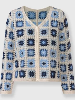 Veste en tricot aspect crochet
