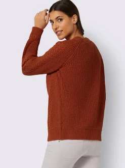 Veste en tricot manches raglan avec joli motif torsadé