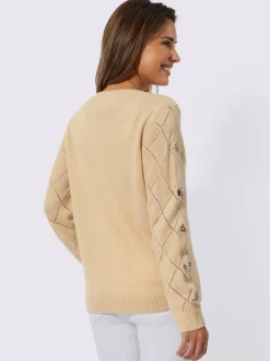 Veste en tricot à motif losanges ajouré et boutons imitation corne