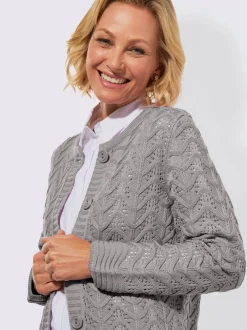 Veste en tricot superbe motif ajouré