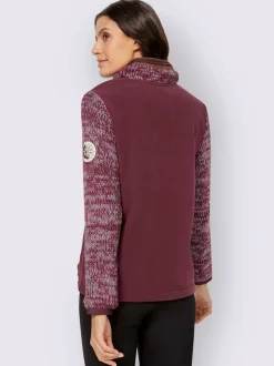 Veste polaire zippée et col montant avec emblème en tricot